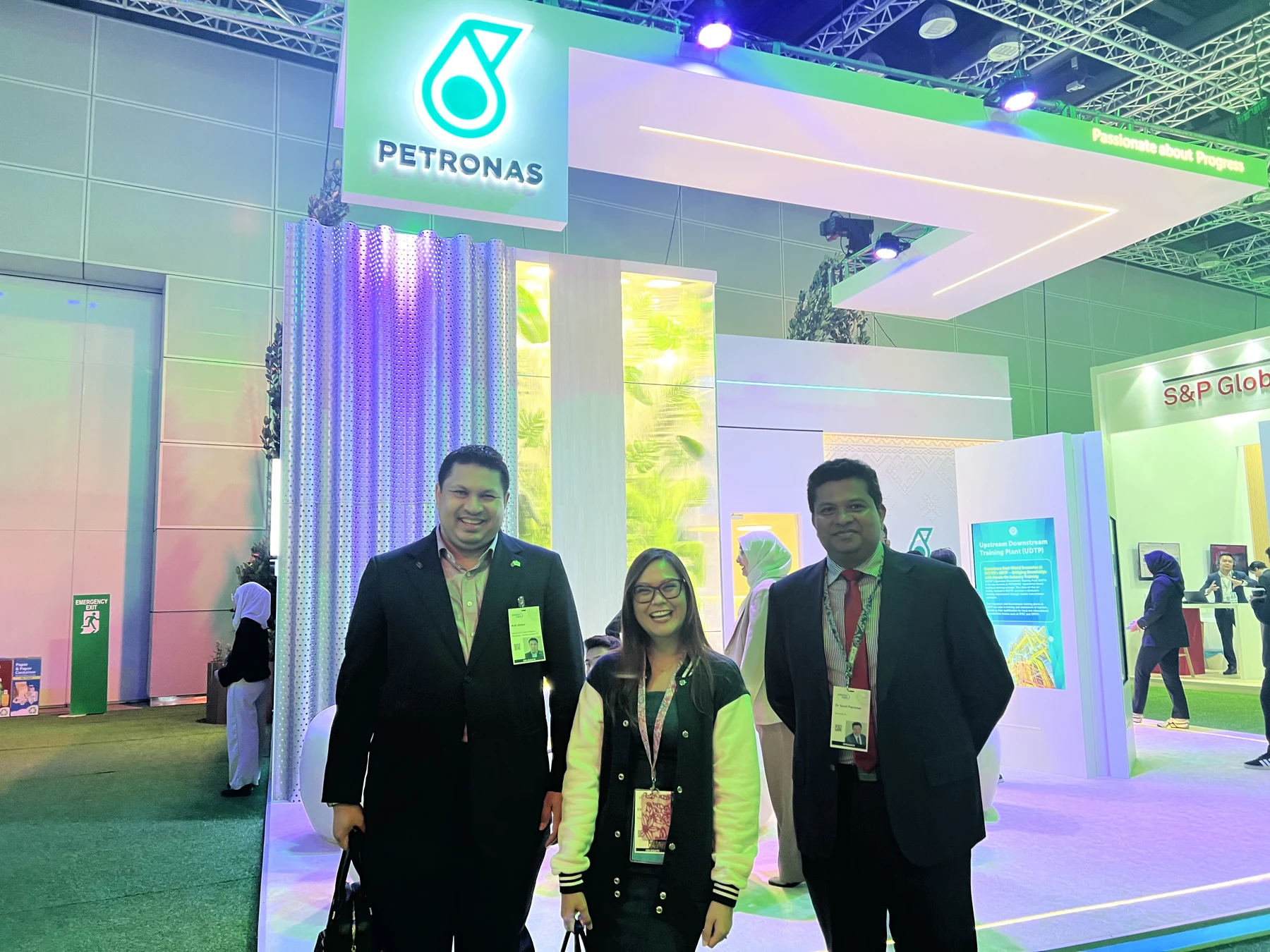 Industry engagement at the PETRONAS exhibition space.
